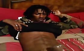 Black thug stroking his huge tasty cock