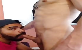 Dominican guy swallowing a huge spanish cock