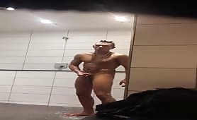 Cute yoing guy wankking his cock in a public shower