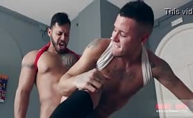 Horny latino stud receiving a beating from a muscled stud