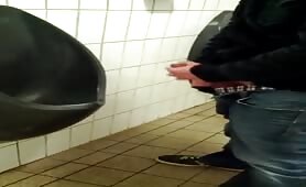 My friend records me while I masturbate in a public bathroom