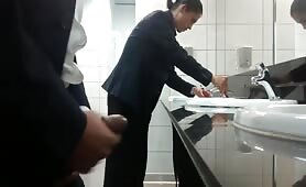 Horny salesman strokes his cock in a public toilet in front of every one