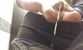 Horny black thug with a beefy cock masturbating in a toilet