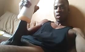 African dude using a flesh light to masturbate for the first time