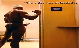 Black hung muscle dude naked and jerking off in the changing room