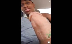 Horny nigga slapping his cock while he masturbates in his car