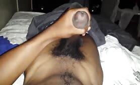Sexy black guy jerking with a nice cumshot