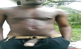 Young haitian wanking his cock outdoor