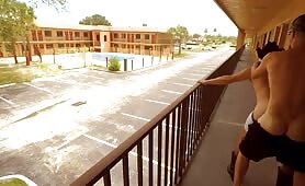 Two guys fucking in a motel balcony