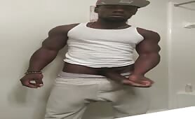 Black muscular thug doing a solo show