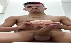 Skinny latino with a huge cock using his new toy to masturbated