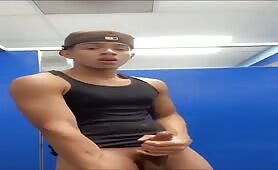 Hot young latino rubbing his delicious cock in a public toilet