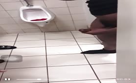 Getting a manual job from a stranger in a public toilet