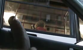 Showing my cock to some people on a bus while masturbating in the car